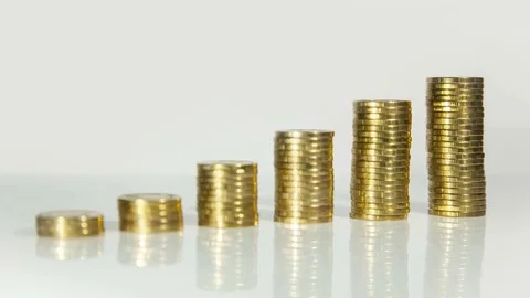 Consecutive alignment of columns of coins. Stock Footage 77234090