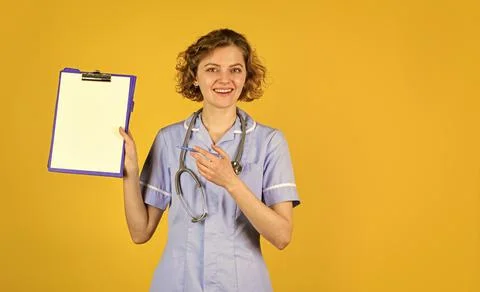 Consent to processing of personal data. Sign here. Woman doctor prescribing Stockfoto's