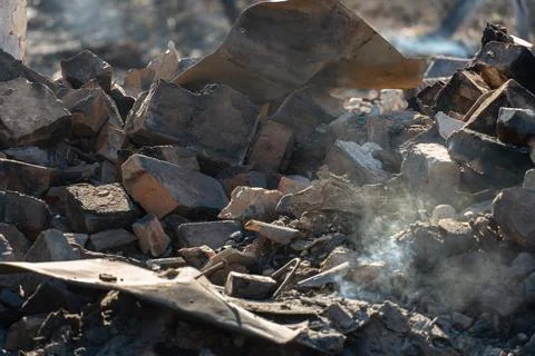 The consequences of a bomb explosion and a fire in a residential building in  Stock Photos