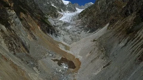 The consequences of global warming. Disappearing glacier, melting ice Stock Footage 230543421