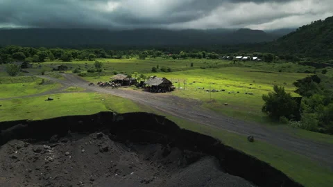 Consequences of a landslide building in danger precipice destruction heavy rains Stock Footage 277183313