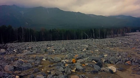 The consequences of a mountain landslide are many stones Stock Footage 78214900