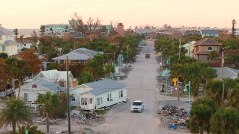 Consequences of natural disaster. Trash from severely damaged houses after Stock Footage 333698907