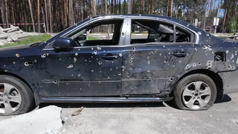 Consequences of the war in Ukraine - a dump of shot and burned cars in the city Stock Footage 191006613