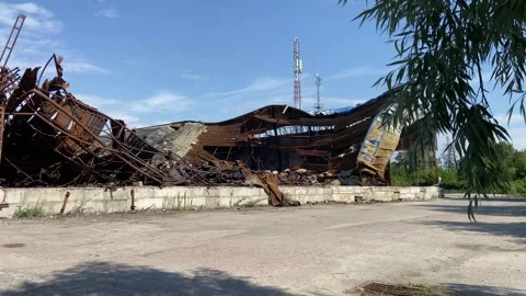 Consequences of the war, a warehouse destroyed by shells in the Kyiv region Stock Footage 246490226