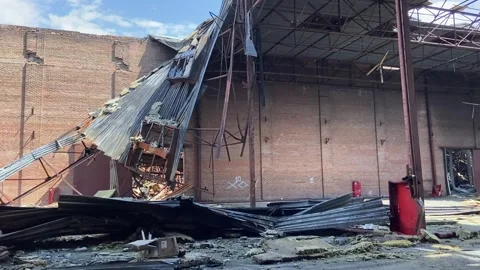 Consequences of the war, a warehouse destroyed by shells in the Kyiv region Stock Footage 246592848