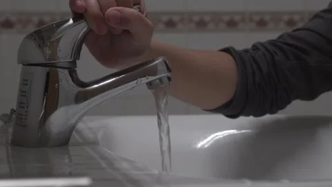 Conserving Water: A Child's Responsible Action  Description: Stock Footage 262988914