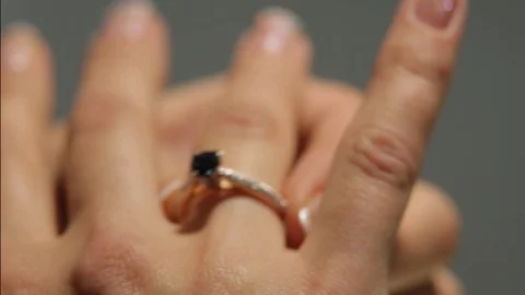 Consider the ring on the hand Stock Footage 100901314