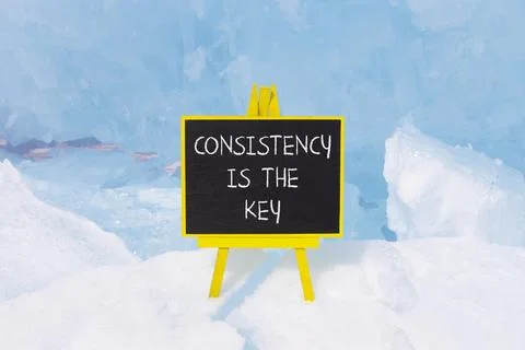 Consistency is the key symbol. Concept words Consistency is the key on beau.. Stock Photos