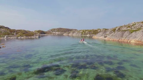 Console boat steering through islets Stock Footage 79479616