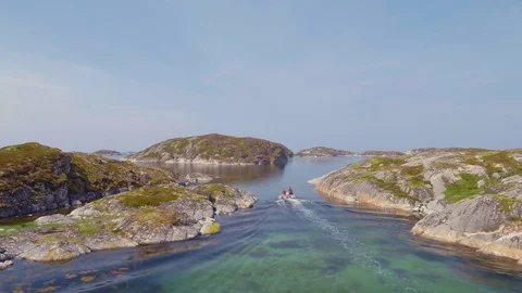 Console boat steering through islets Stock Footage 79480119