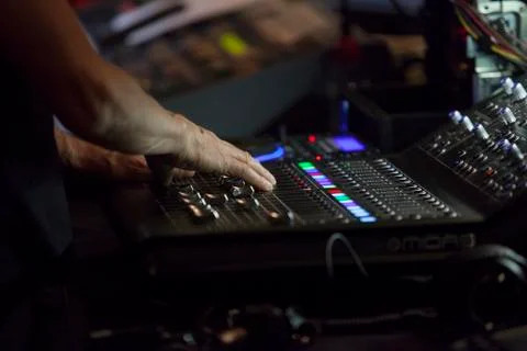 Console controller hand working during theatre play Stock Photos