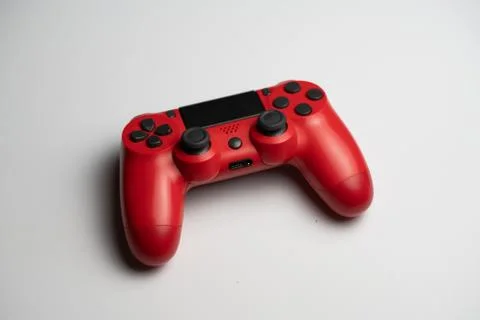 Console Player in red with black buttons Stock Photos