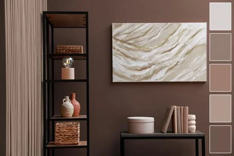 Console table and shelving unit near wall in mocha mousse shade. Interior d.. Stock Photos