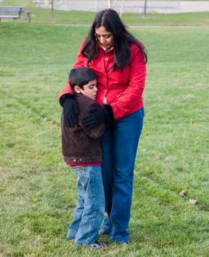 Consoling an upset child Stock Photos