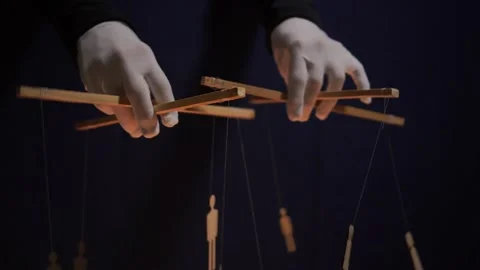 Conspiracy theory concept. People - puppet dolls marionette controlled Stock Footage 166991067