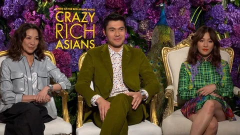 Constance Wu, Gemma Chan and Henry Golding at 'Crazy Rich Asians' press junket Stock Footage 101200123
