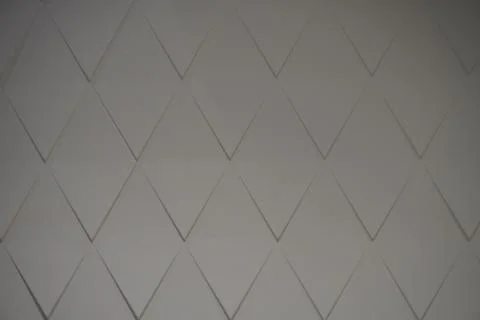 A constant pattern on a wall paint in white Foto stock