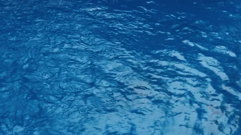 Constant water flow on a blue pool. Full frame Stock Footage 146371398