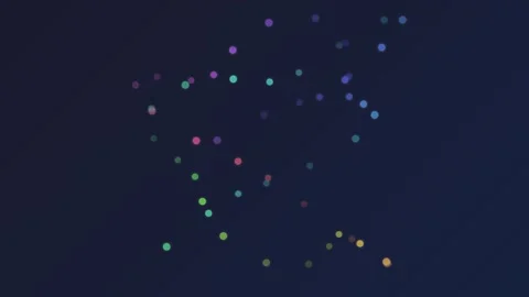 A constellation of colorful bokeh lights floating in a dark night sky Video stock 335117647