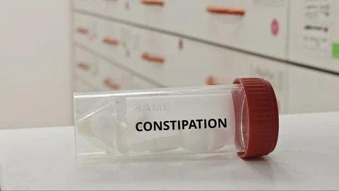 CONSTIPATION treatment tablets used to relieve bowel obstruction and improve Stock Photos