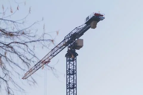 Constraction crane blue sky background. Stock Photos