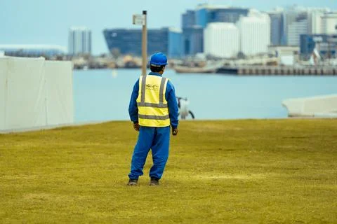 Constraction worker having thier lunch breack at corneach. Doha, Qatar 10-0.. Stock Photos