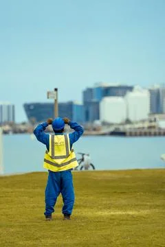 Constraction worker having thier lunch breack at corneach. Doha, Qatar 10-0.. Stock Photos