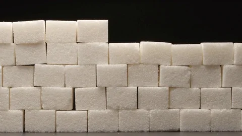 Construct of sugar wall on black background (stop motion) Stock Footage 73071567