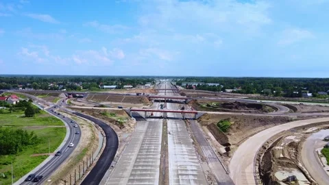 Constructing large-scale highway with overpasses in rural urban area Stock-Footage 342597610
