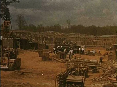 Constructing new homes, building ships, a steel mill, a tire factory, a Vídeos de archivo 75281991