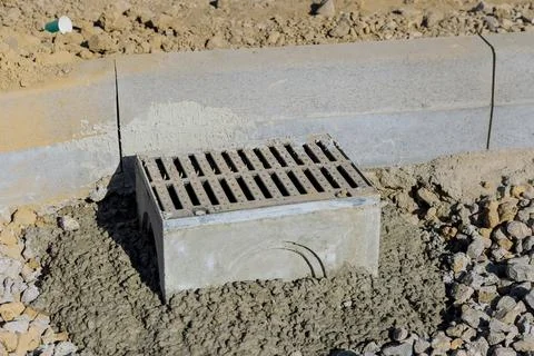 Constructing a road on a well-prepared concrete base during the laying of the Stock Photos