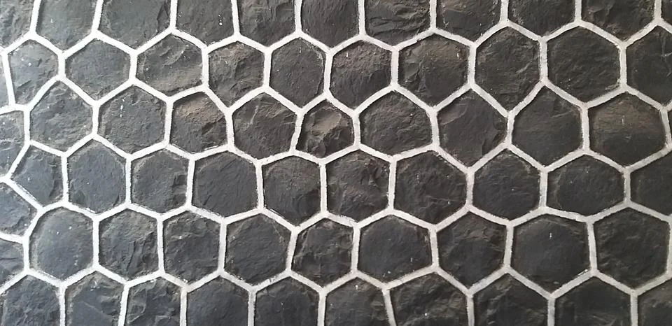 Constructing a stone wall Stock Photos