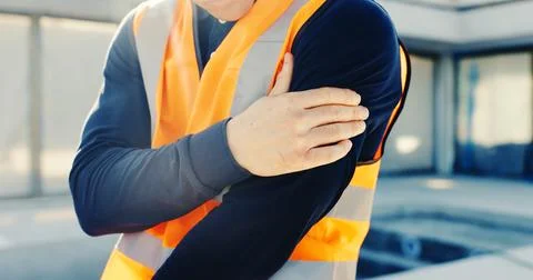 Construction, accident and man with shoulder pain, strain and injury for stress Stock Photos