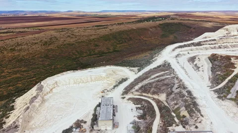 Construction activities at a quarry site in a rural area during a clear day Stock Footage 345455566