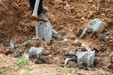 Construction activity digging foundation urban site outdoor close-up engine.. Foto stock