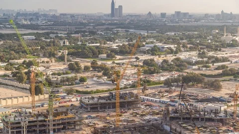 Construction activity in Dubai downtown with cranes and workers timelapse, UAE. Stock Footage 110836497