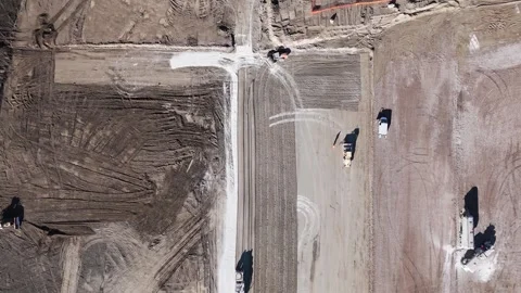 Construction activity at a land development site with heavy machinery in Stock Footage 281333703