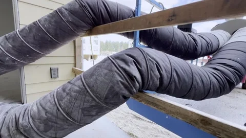 Construction air ducts drying interior through open window Stock Footage 333122546