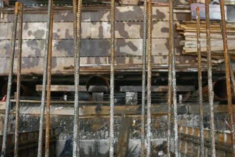 Construction and building of a bridge on the river Stock Photos