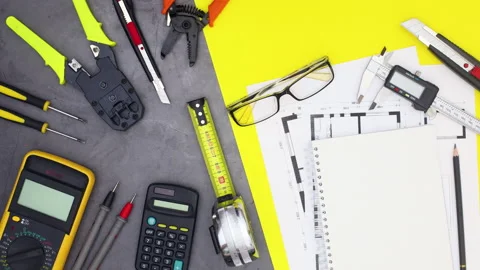 Construction and building tools move on grey yellow theme. Stop motion Stock Footage 136920944