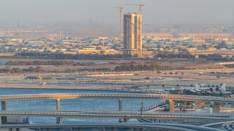 Construction and intersection near Dubai Creek Harbor aerial timelapse. Dubai - Stock Footage 120389745