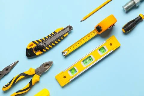 Construction and renovation tools flat lay with utility knife measuring tape  Stock Photos