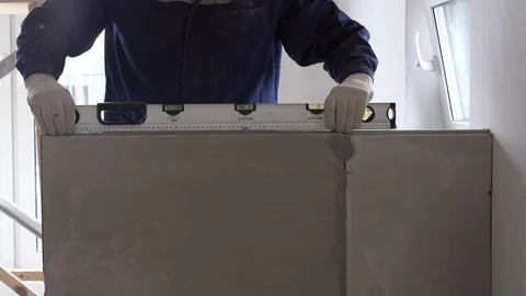 Construction and repair - installation of an interroom partition from tongue-and Stock Footage 106659790
