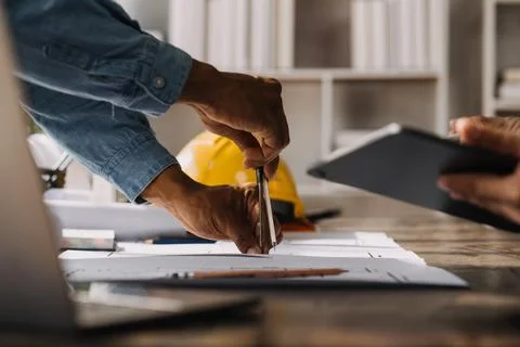 Construction and structure concept of engineer working drawing on blueprint.. Stock Photos