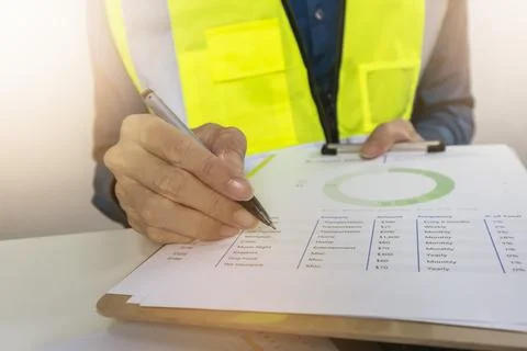 Construction and system engineers explain data and report construction plan.. Stock Photos