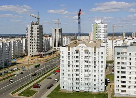 Construction and urban development seen from above in a busy city area on a.. Stock Photos