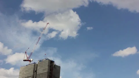 Construction of apartment block with blue sky Stockbeeldmateriaal 24866194