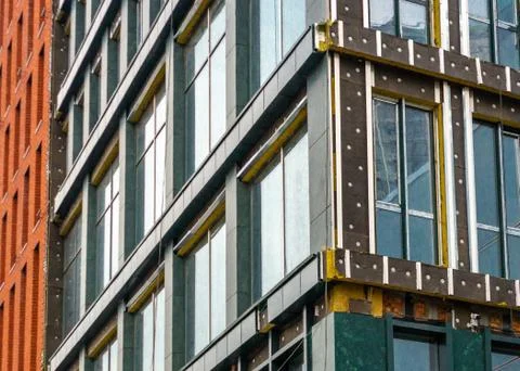 Construction of an apartment building made of bricks. Stock Photos