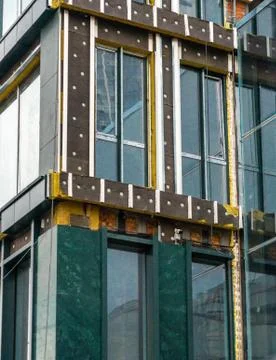Construction of an apartment building made of bricks. Stock Photos